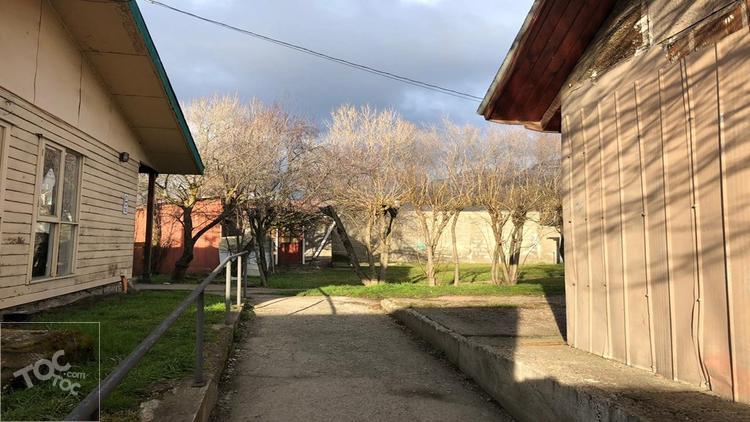 Excelente oportunidad, vendo terreno de 1250 mt2 con una casa y cabañas en el centro de la ciudad de Coyhaique