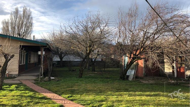 Excelente oportunidad, vendo terreno de 1250 mt2 con una casa y cabañas en el centro de la ciudad de Coyhaique