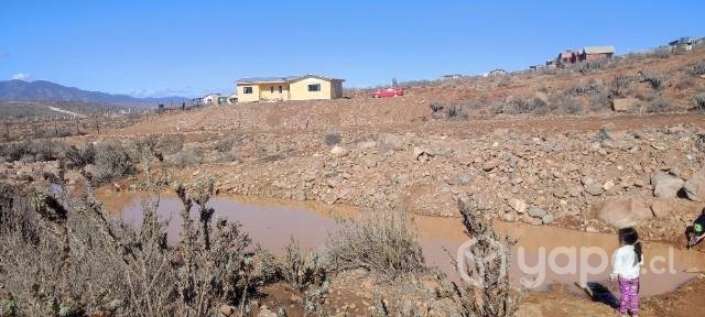 Parcela con casa en sector los porotitos
