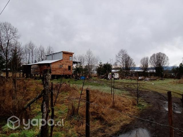 Terreno con casa